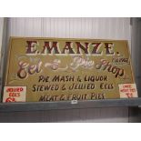 A painted "Eel and Pie Shop" sign