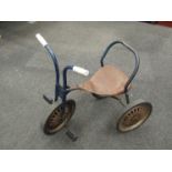 A 1950's child's tricycle in original condition with original blue paint