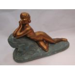 A Circa 1930 French Art Deco reclining nude plaster sculpture,
