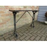 A 19th Century Scottish cast iron based table, signed Glasgow,
