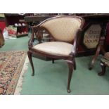 An Edwardian inlaid mahogany tub chair, upholstery a/f,