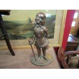 A polished brass flat back door stop Mr Pickwick,