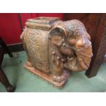 A Stone elephant umbrella stand