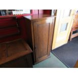 An Edwardian oak music cabinet containing various 78's,