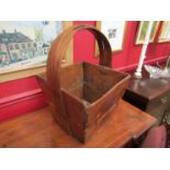 An antique elm country log basket,