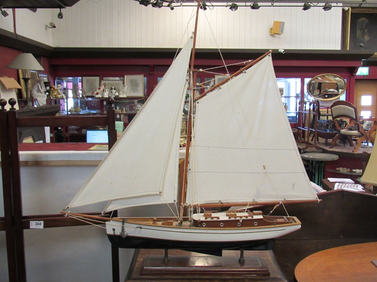A wooden model yacht,