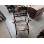 A Regency yew wood and elm country elbow chair,