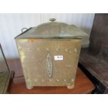 An Edwardian brass coal box