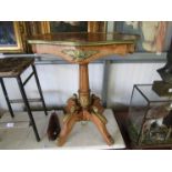 A Continental inlaid centre table with brass rim and mounts