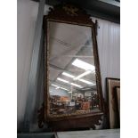 A 19th Century walnut framed pier mirror of large proportions with Hoho bird to top 62x120cm