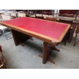 A 1950's oak desk/table with twin pedestal's, red leather top,no fixing screws,
