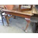 A 1930s mahogany dining table on ball and claw legs 82x90cm