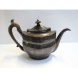 A George III silver teapot by Charles Fox I and James Turner, London 1803, dented,