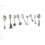 Nine various silver souvenir/trophy and functional spoons,