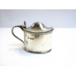 A Martin Hall & Co silver mustard, Sheffield 1908, 7cm tall,