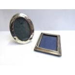 A silver oval photograph frame and another of rectangular form (2)