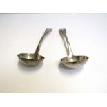 A pair of George III Thomas Wilkes Barker silver ladles, London 1818,