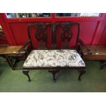 A George III revival mahogany two seater chair-back sofa the fretwork back splats and outswept