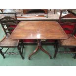 A Regency mahogany line inlaid tripod table,