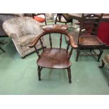 An ash and elm Victorian broad arm smokers bow armchair,