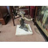 An Art Deco seated figure of a lady on marble base,