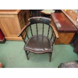 An Edwardian oak and ash captains desk chair with ring turned decoration,