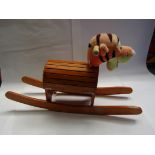 A Winnie The Pooh 'Tigger' rocking horse