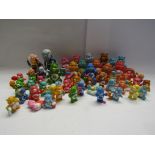 A collection of 1980's Care Bear plastic figures