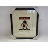 A framed and glazed limited edition Dennis The Menace print,