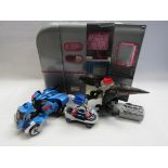 Four assorted plastic toys including Go Girl caravan, Sonic The Hedgehog,