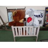 Two large soft filled bears and a doll's cot