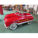 A tinplate Fire Chief pedal car