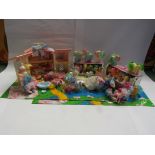 A good collection of original My Little Pony figures, two carry cases, stable,