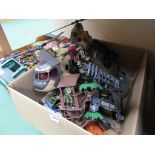 Assorted plastic toys including military helicopter,