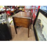 A circa 1930 oak sewing cabinet with contents, the hinged top over a single drawer, 52.