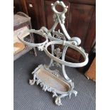 A Victorian Art Nouveau cast metal umbrella stand,