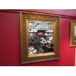 An 18th Century style ornate gilt framed bevelled edge wall hanging mirror (frame 85cm x 75cm)