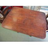 A Regency mahogany line inlaid tripod table on castors,