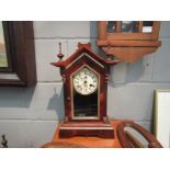 An arch top mantel clock