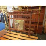 An early 20th Century wall mounted coat/hat rack with bevel edged mirror