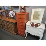 A retro 1960's teak slim bank of seven drawers