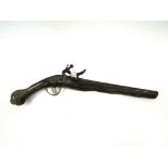 An 18th Century flintlock pistol,