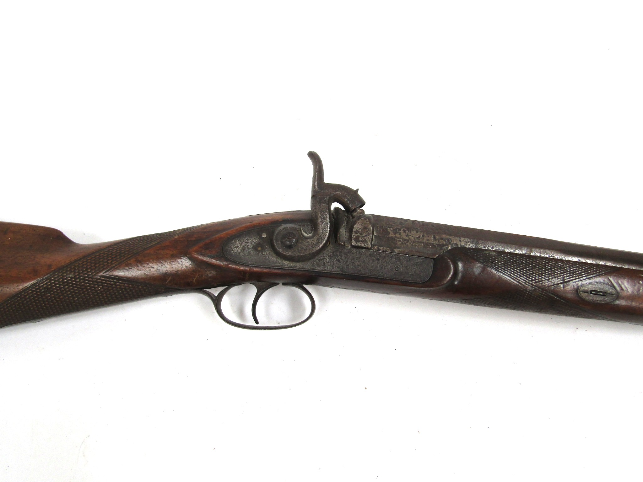 A 19th Century shotgun, the lock plate and hammer with chased foliate engraved detail,