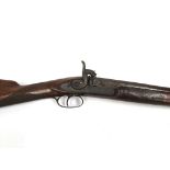 A 19th Century shotgun, the lock plate and hammer with chased foliate engraved detail,