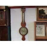 A mahogany wall barometer, shell inlaid,