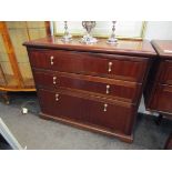 A Meredew chest of three drawers,