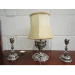 A pair of Elkington & Co silver plated candlesticks with figural and floral detailing,