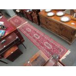 Two small red ground Royal Keshan rugs,