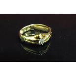 An 18ct gold gent's ring set with single diamond in open mount. Size R, 5.