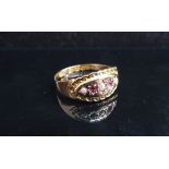 A 15ct gold ruby and seed pearl set ring, stamped Chester. Size M/N, 1.